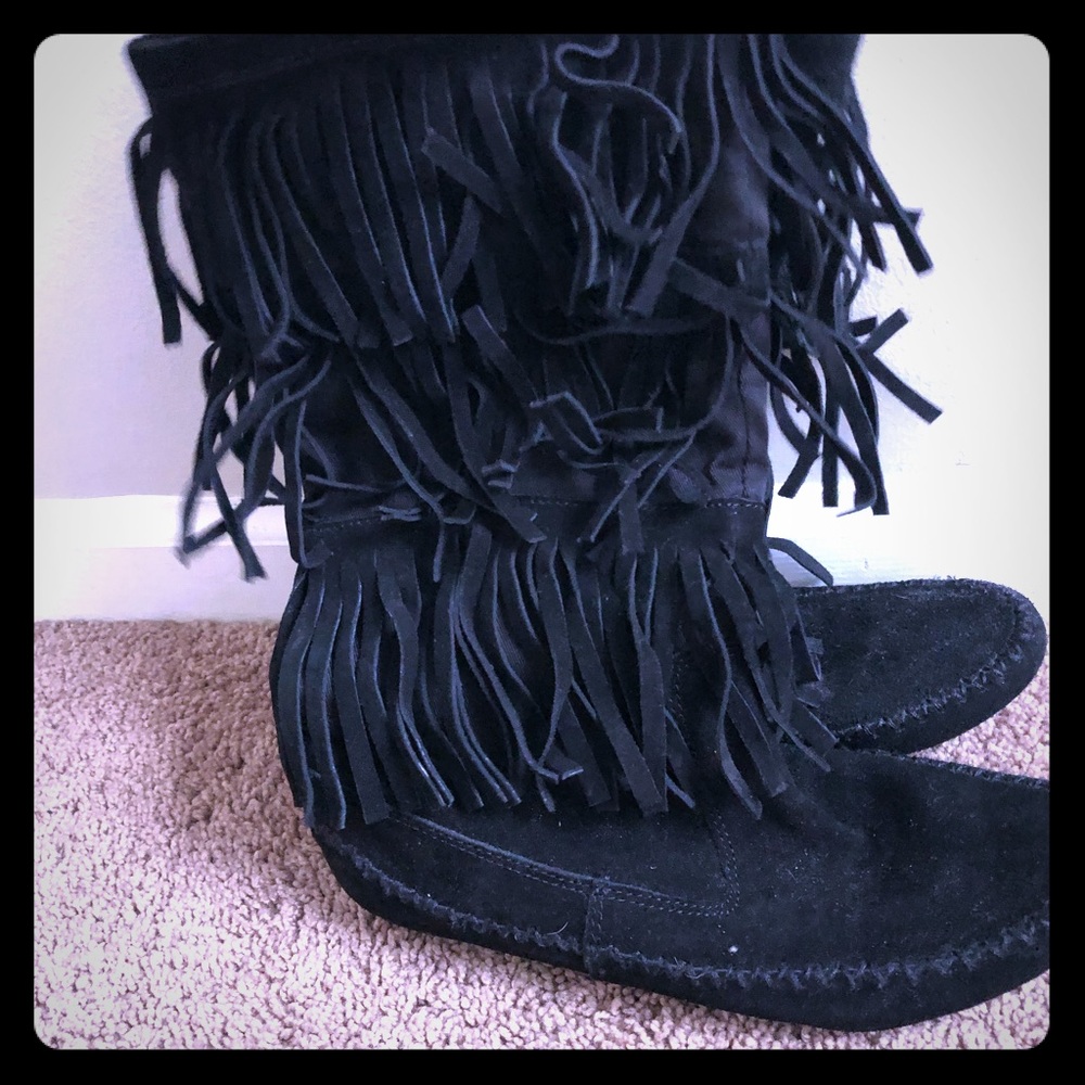 Black fringe moccasin boots
